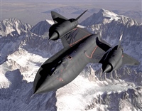SR 71 OVER SNOW CAPPED MOUNTAINS